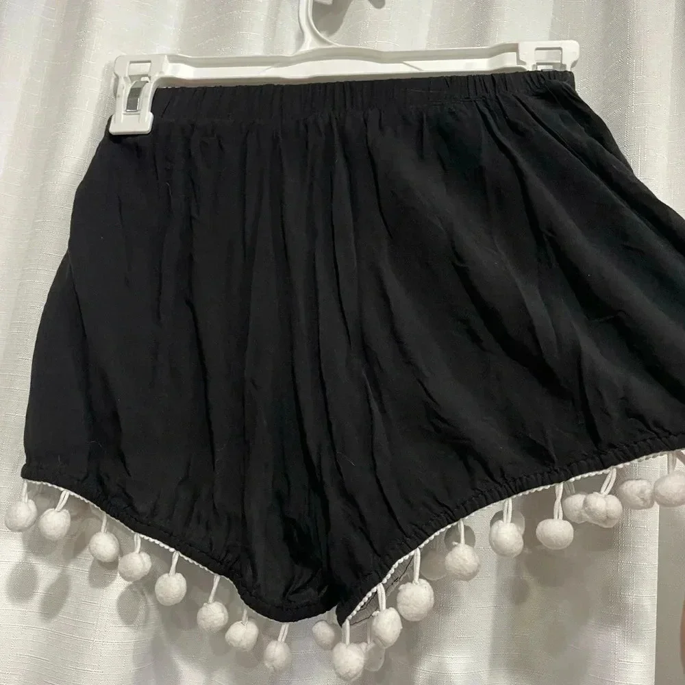 Black shorts with white trim